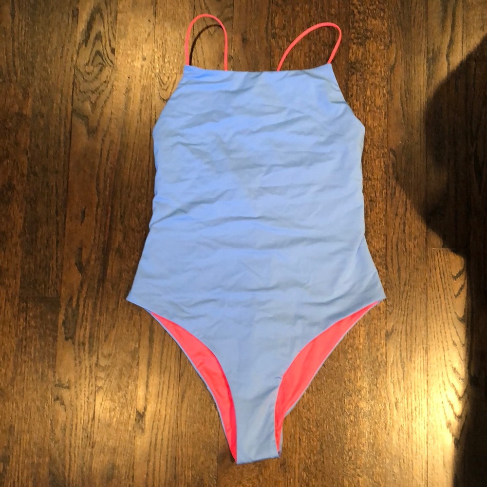 One piece reversible blue and pink swimsuit